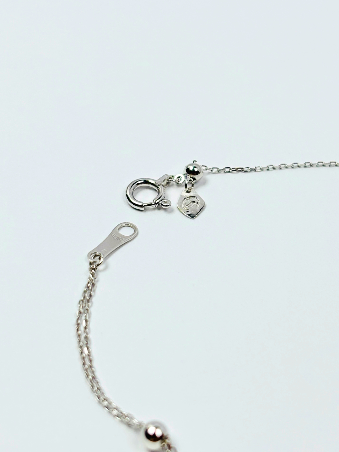 K18・メッセージクロスブレスレット – ex'position