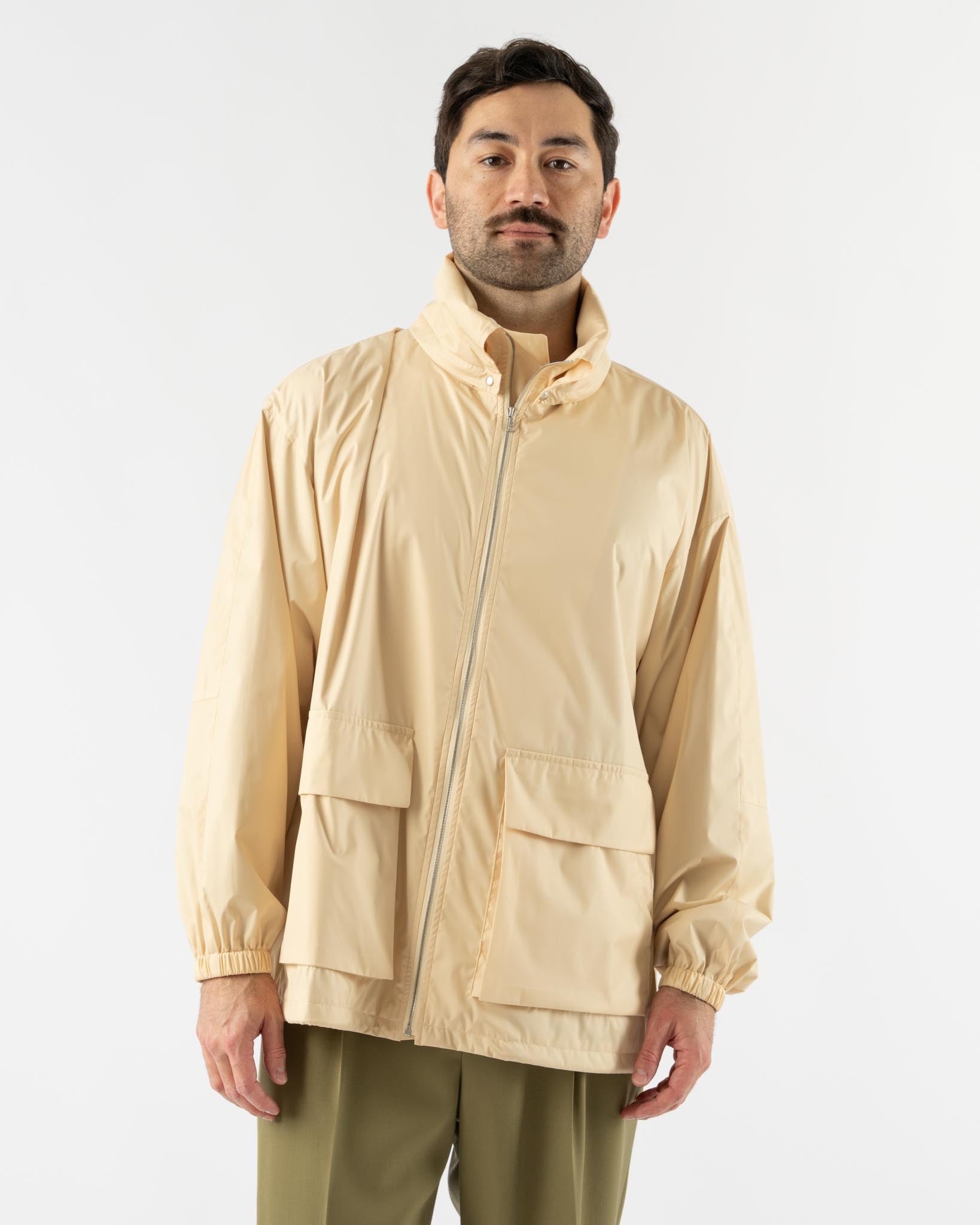 Auralee Hard Twist Polyester Satin Laminate Zip Blouson in Light