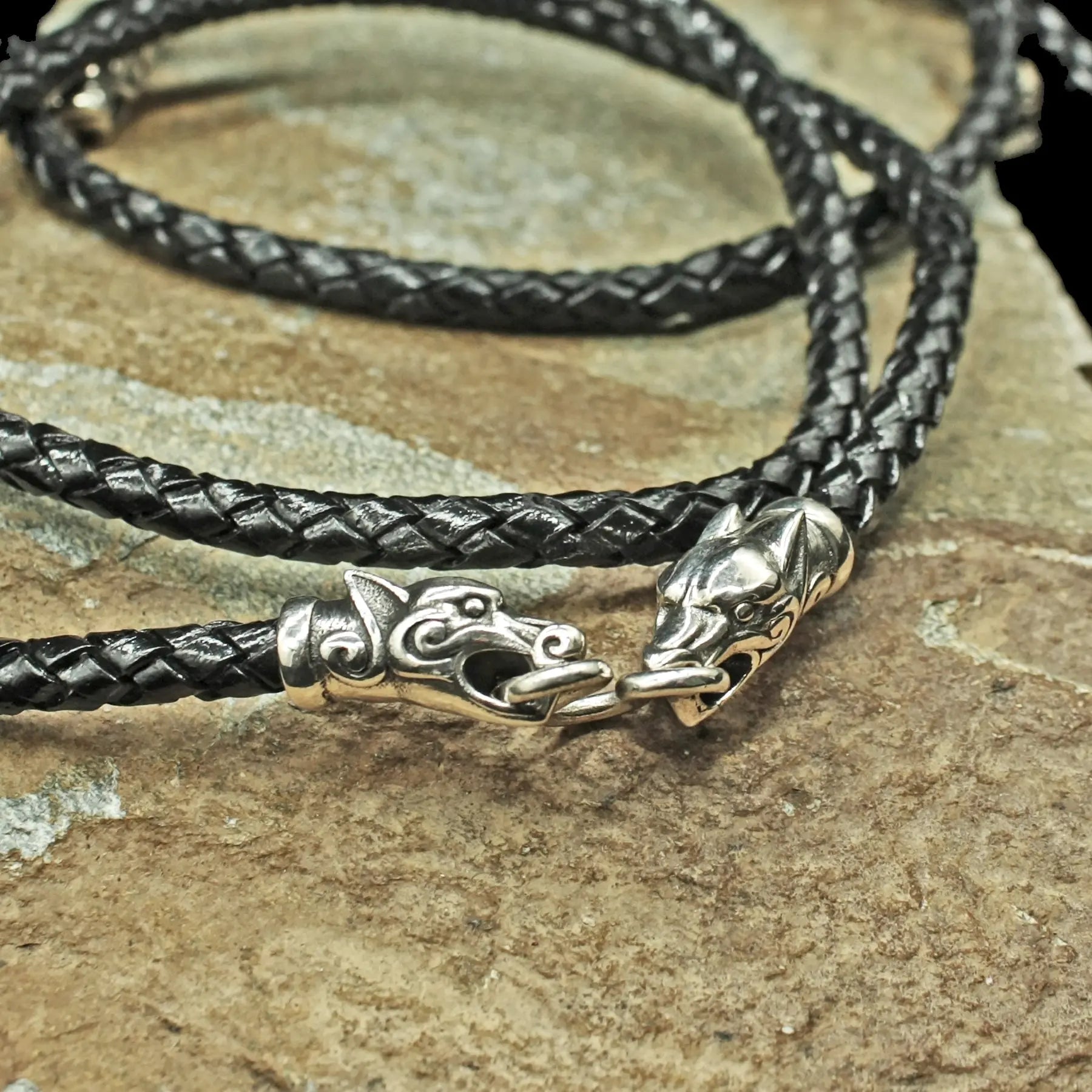 Braided Leather Viking Necklace with Silver Ferocious Wolf Heads