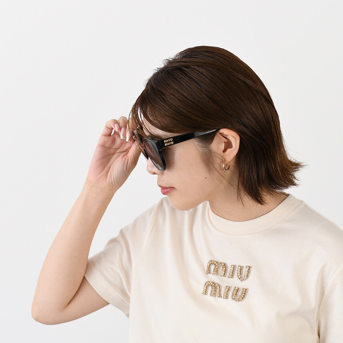 楽天市場】MIU MIU ミュウミュウ アイウェア ロゴ サングラス MU 01ZS