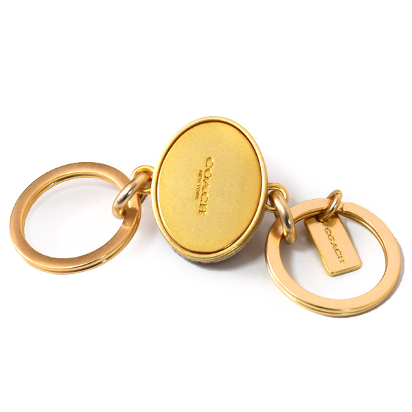 COACH】コーチ メタル シグネチャー ターンロック バレット ラメ