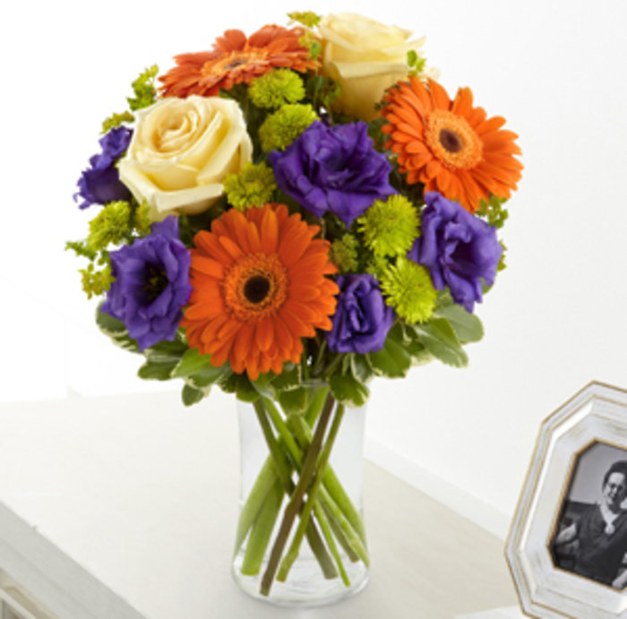 S40-4529: Rays of Solace Bouquet arranged by a florist in Fort
