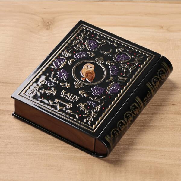 ミニミニ魔法辞書缶 チョコクランチ入り 1個 - カルディコーヒー