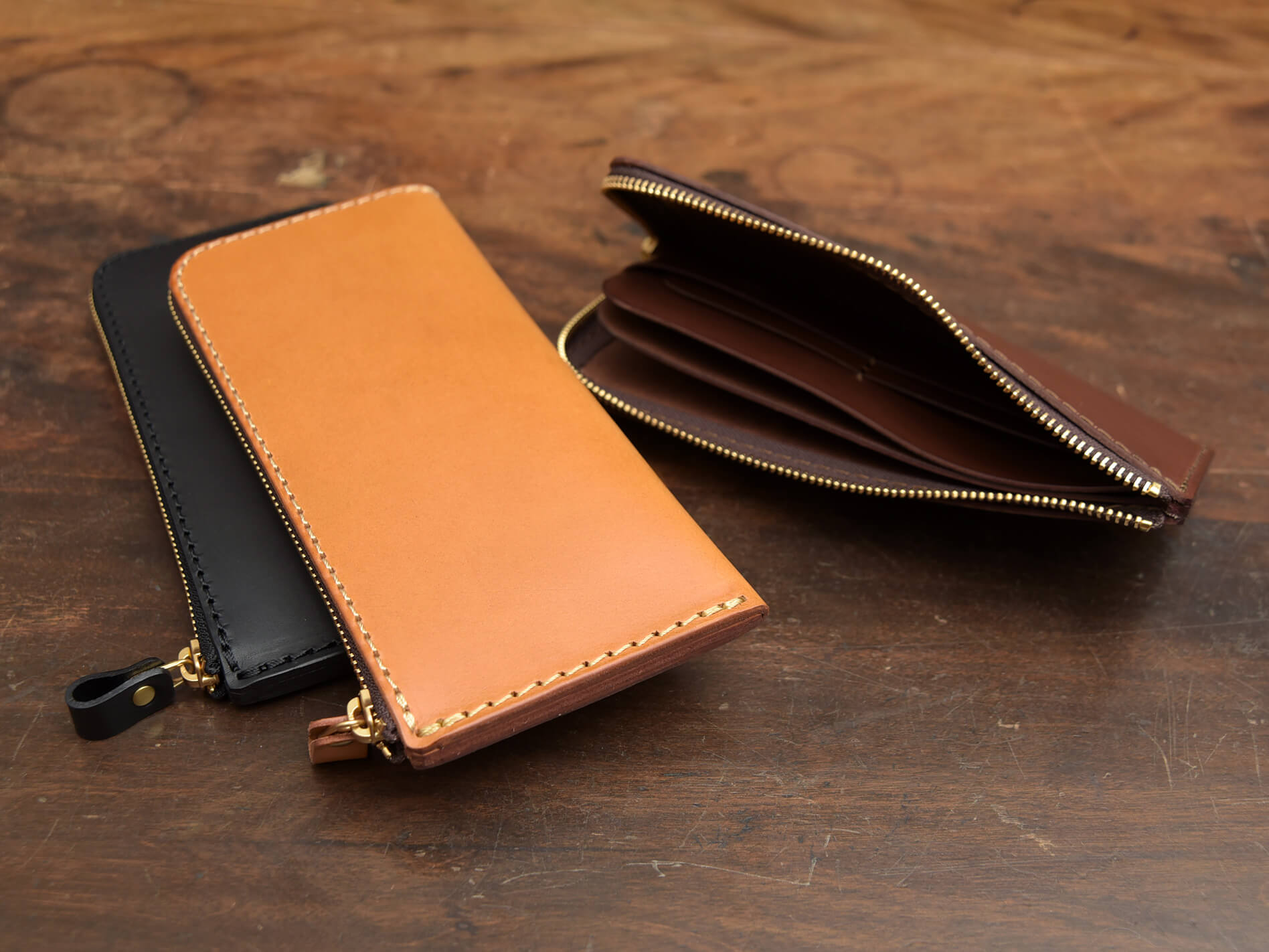 シンプルで使いやすいL字ファスナーのレザー長財布 / 革鞄のHERZ