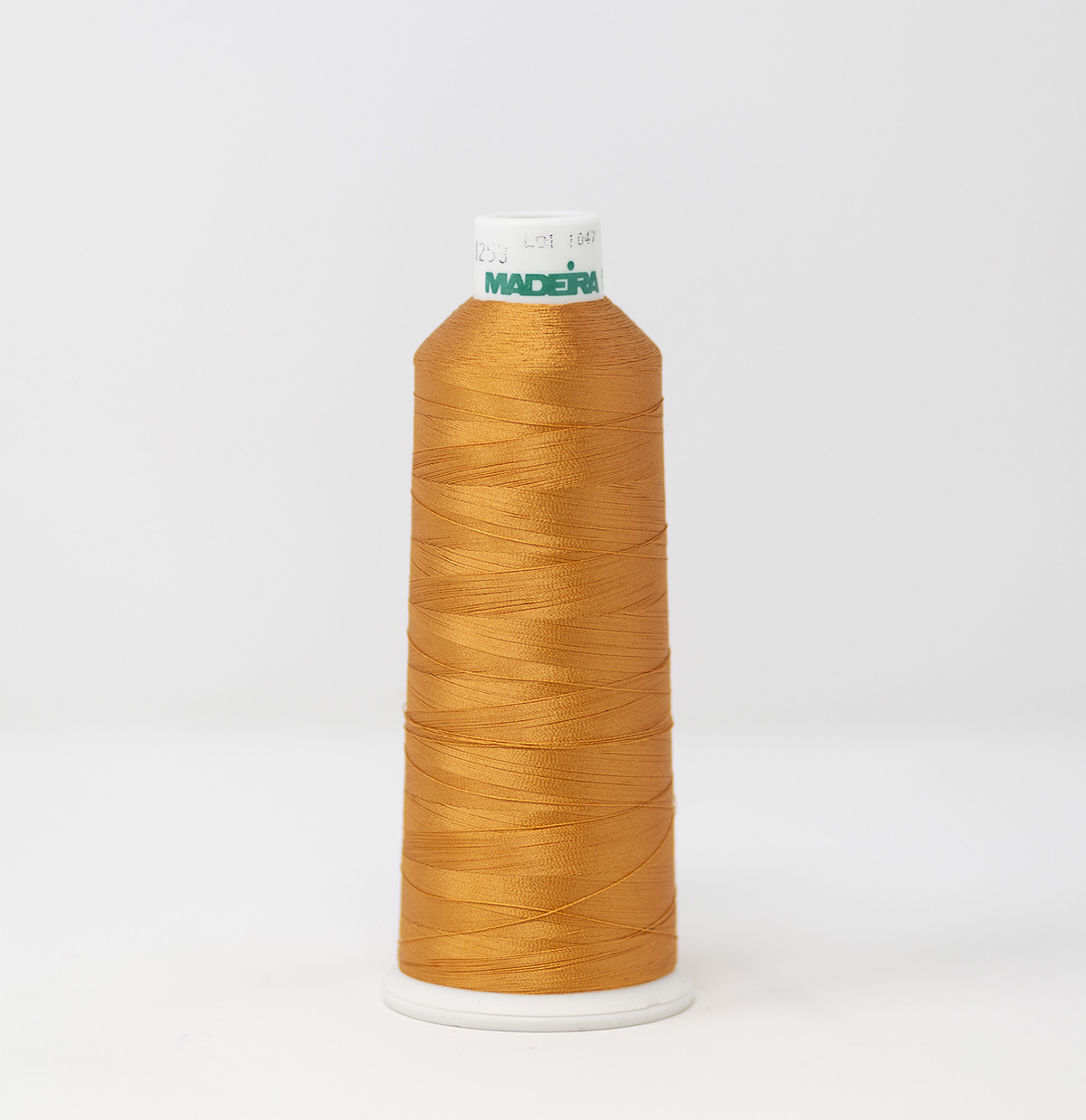 910-1253 5,500 yard cone of #40 weight Penny Brown Orange Rayon