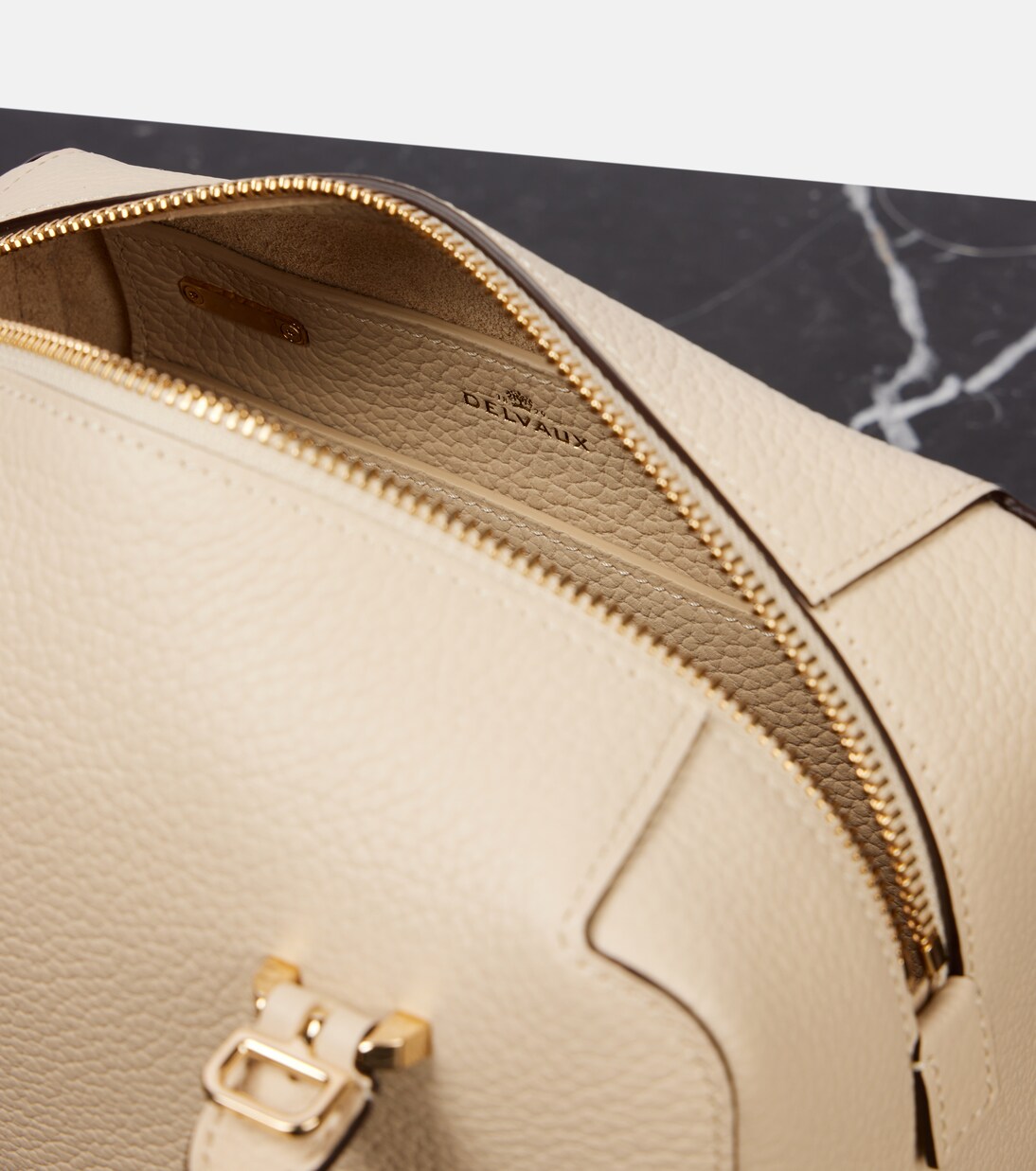 Cool Box Mini leather tote bag in beige - Delvaux | Mytheresa