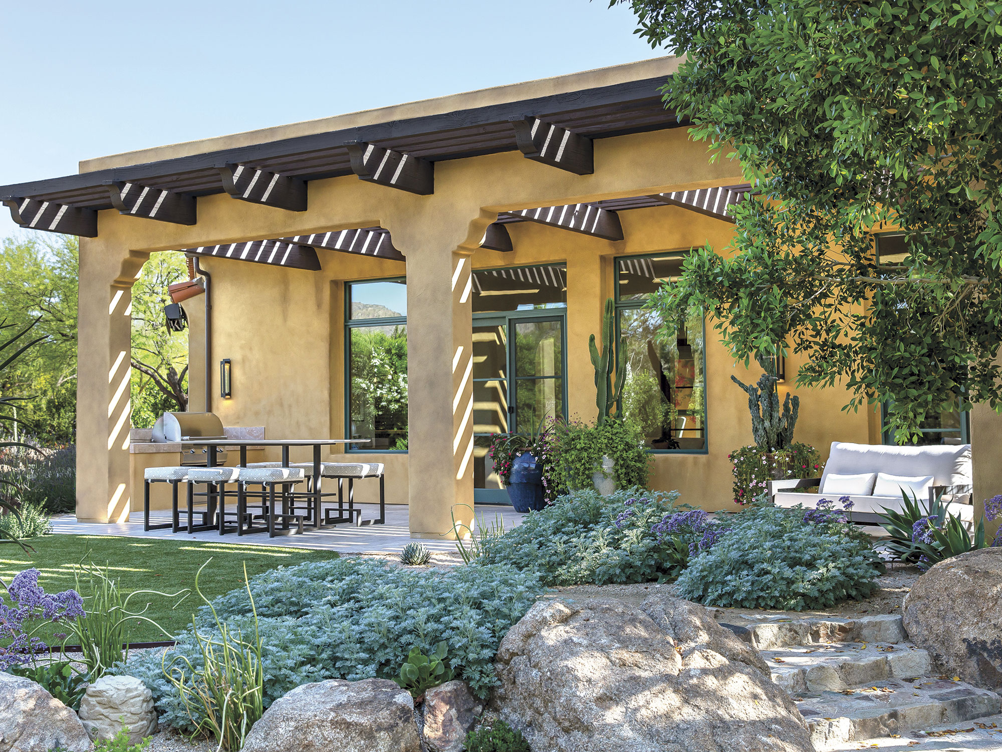 A Stunning Hillside Estate Features Winding Walkways and Colorful