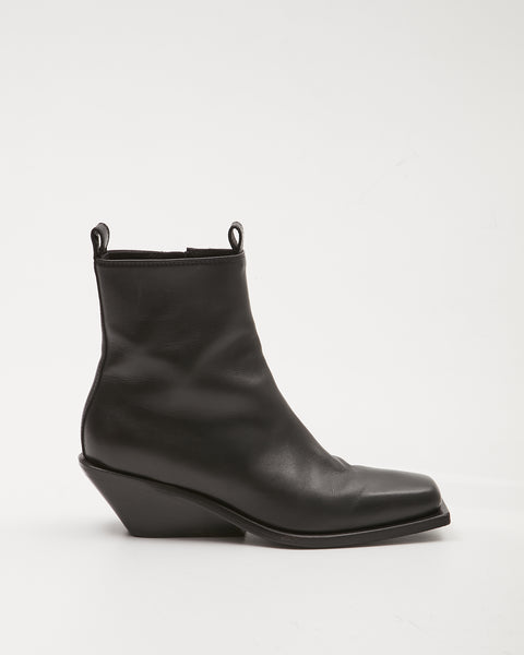 Explore a Ann Demeulemeester Black Leather Henrik A. Ankle Boots
