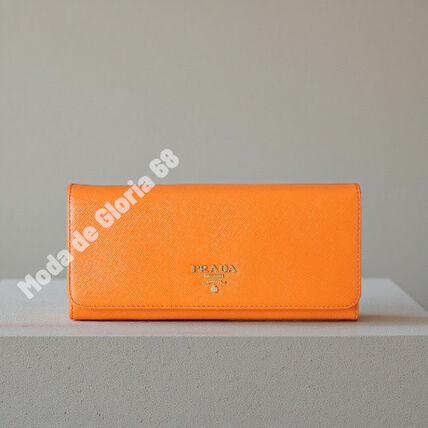 オレンジ系 PRADA(プラダ) 長財布(レディース) - ブランド通販のBUYMA