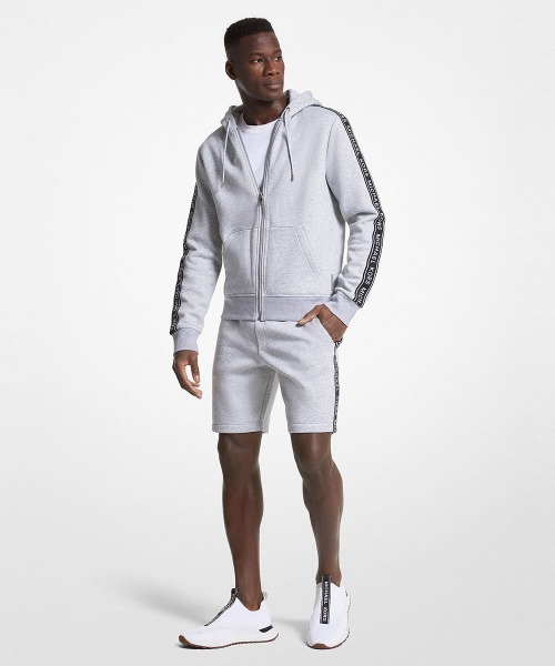 MICHAEL KORS（マイケルコース）の「MK ロゴテープ フルジップ