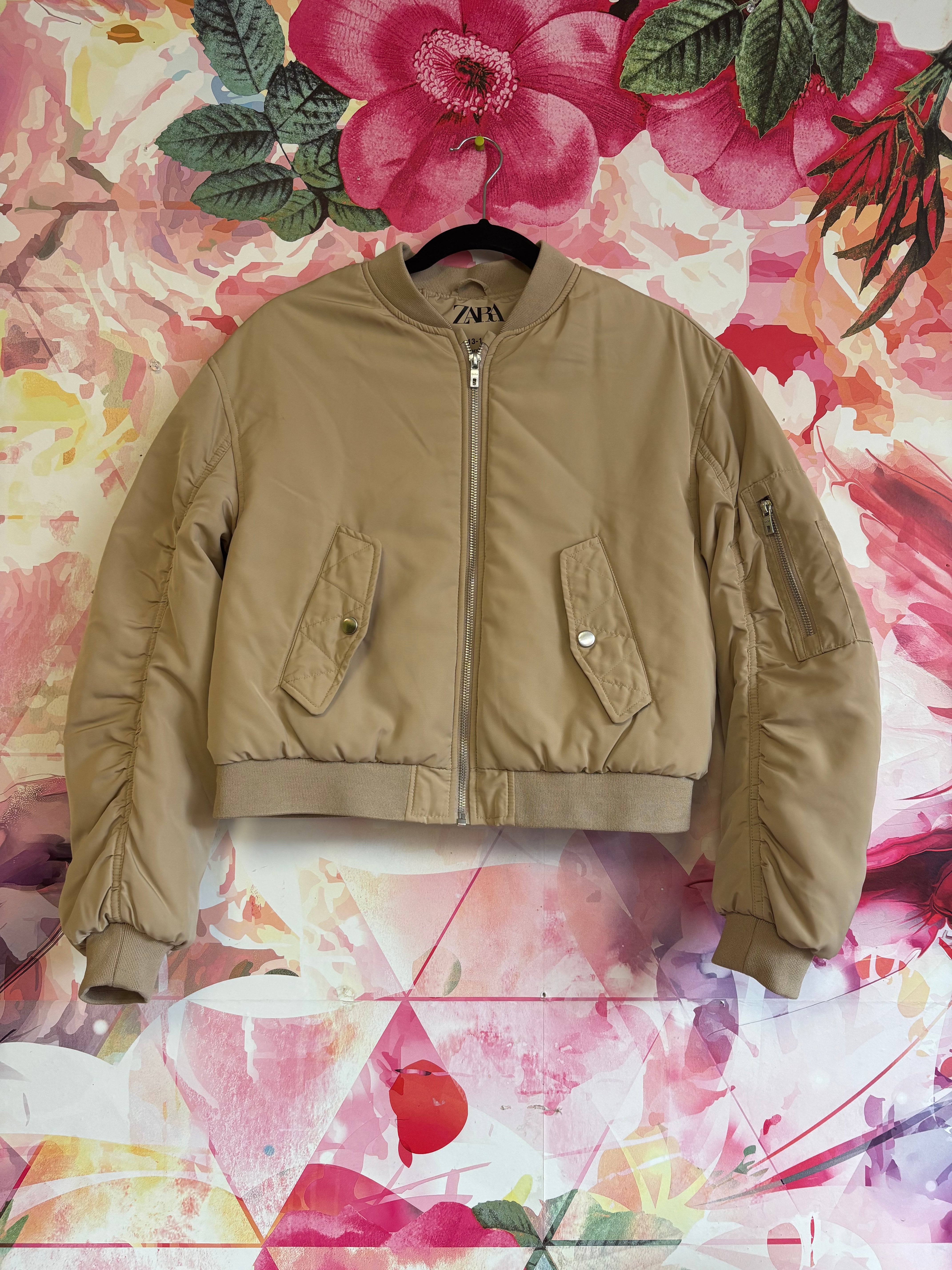 Zara beige crop bomber jacket with zipper pockets on sleeves. Size