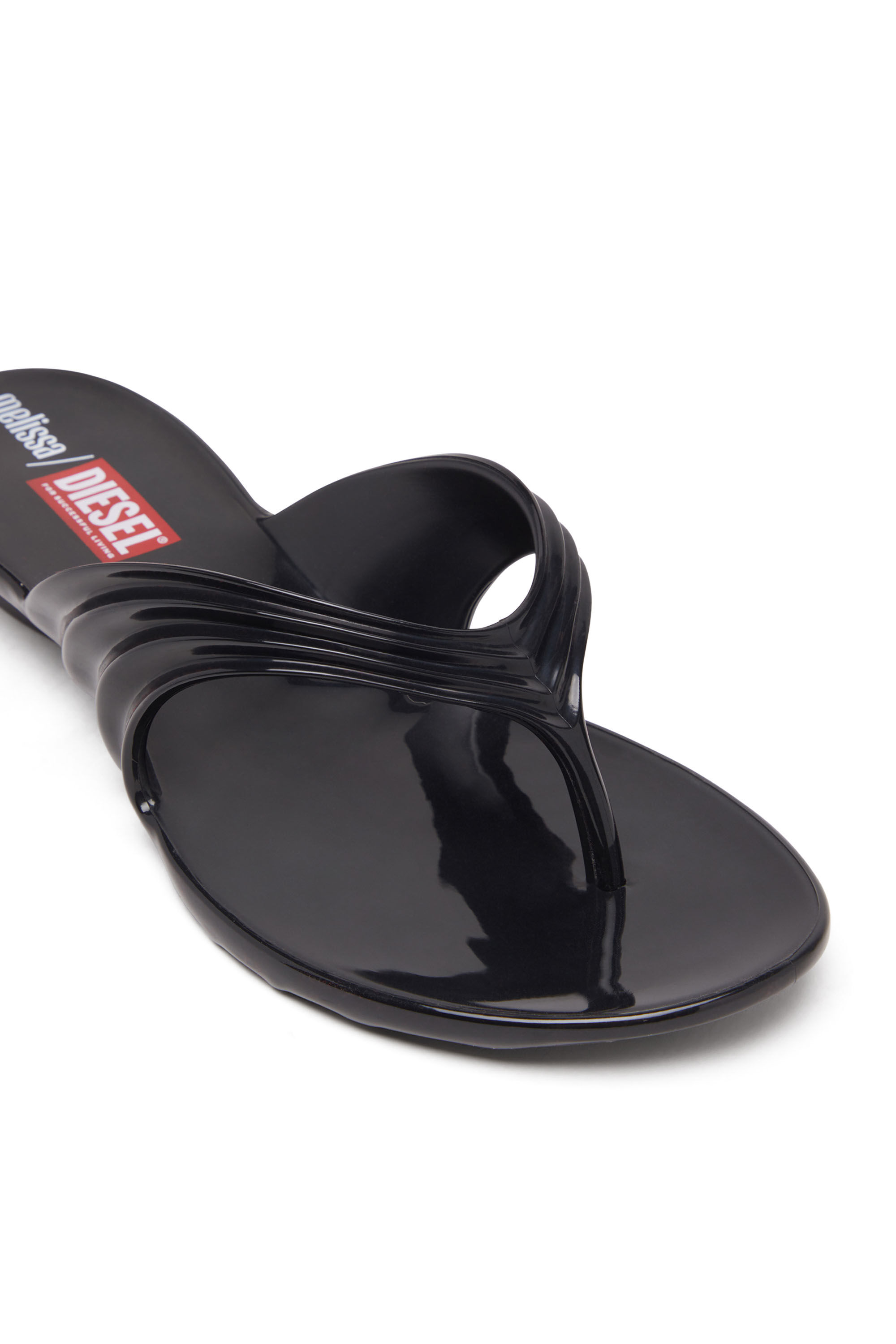 Women's Sculptural flip-flops in Melflex® | Black | Diesel