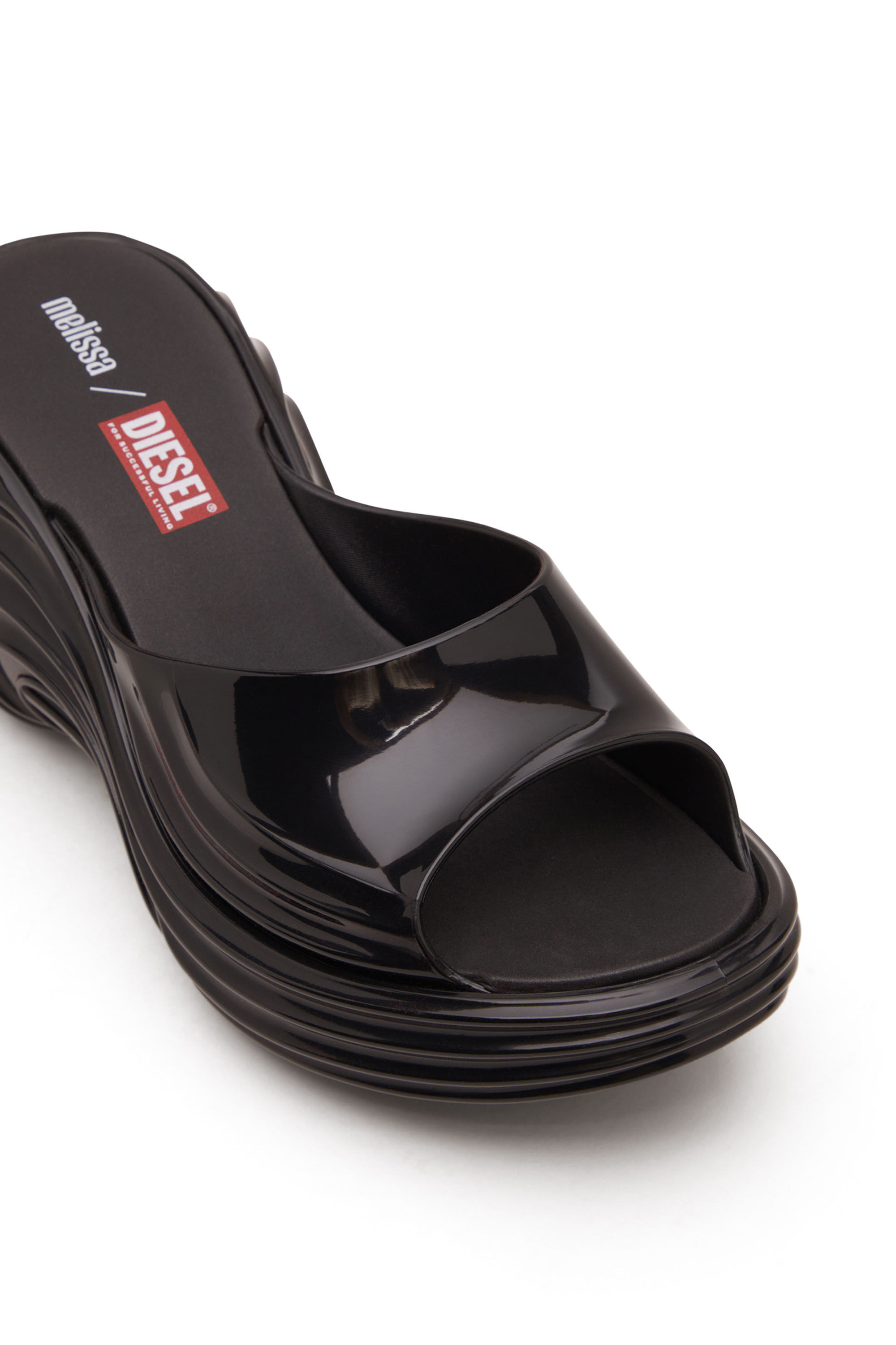 Women's Platform mule in Melflex® | Black | Diesel