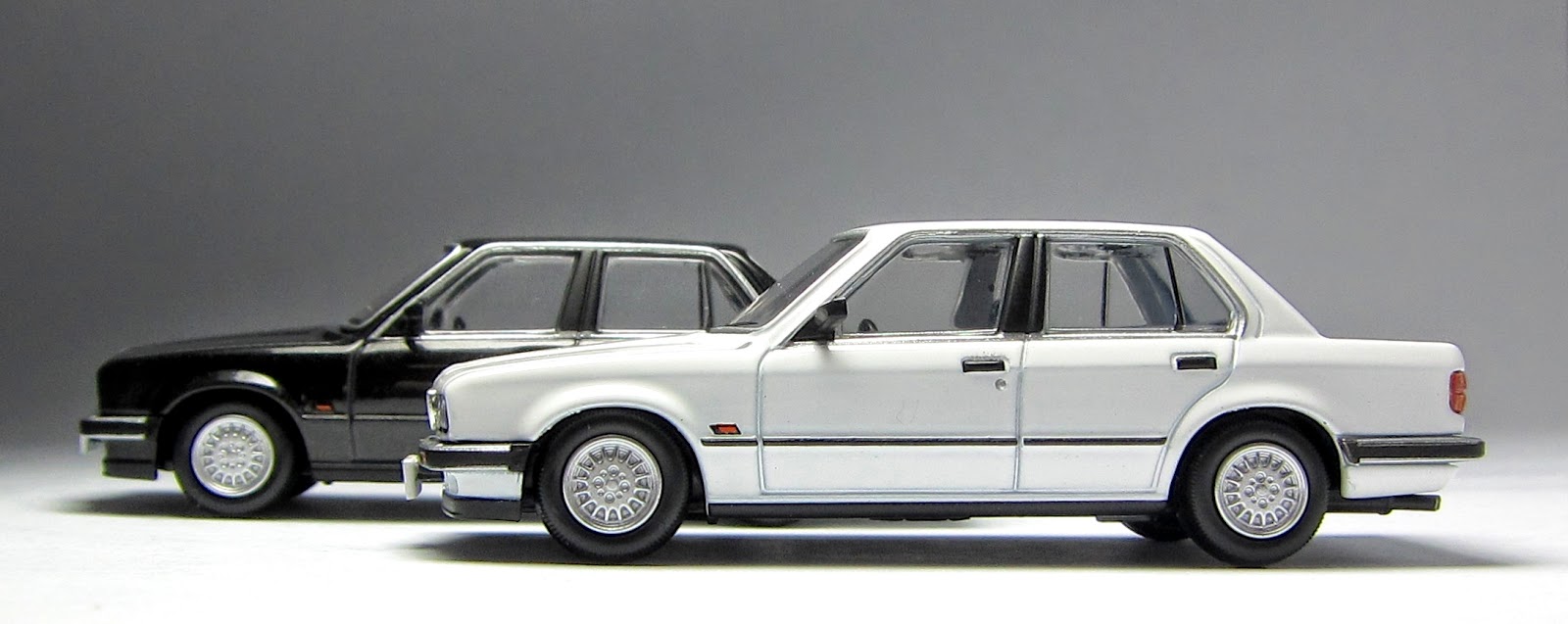 First Look: Tomica Limited Vintage BMW 325i 4-door in both black