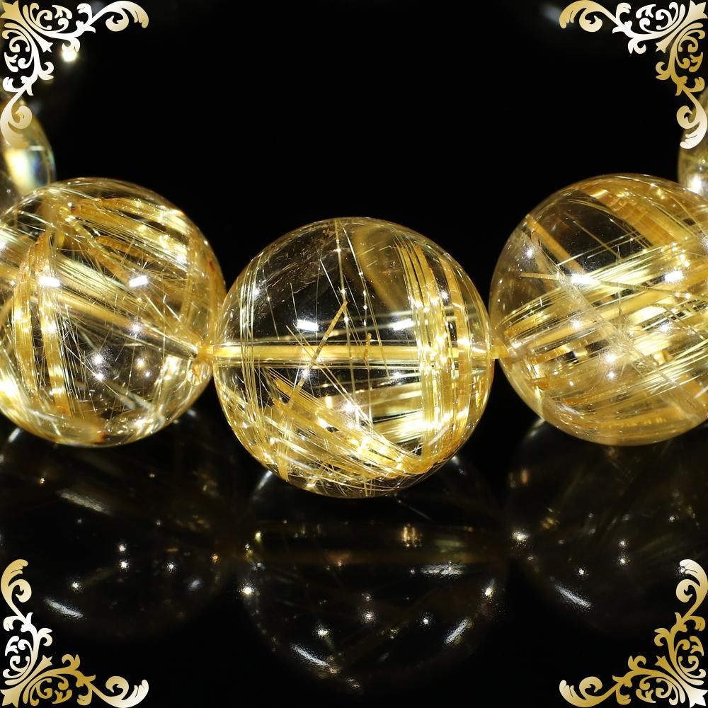 プレミアムイエローゴールドタイチンルチルクォーツ 20mm～20.5mm玉