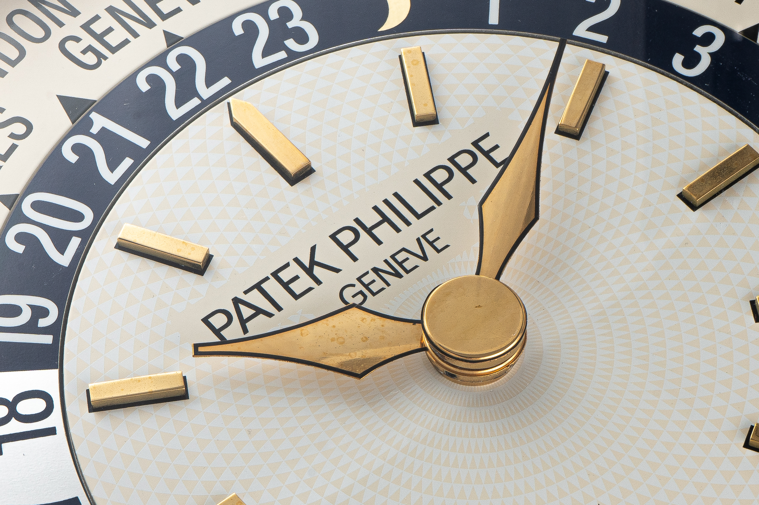 Ineichen Auctioneers - Worldtimer Wall Clock in Gilt Brass