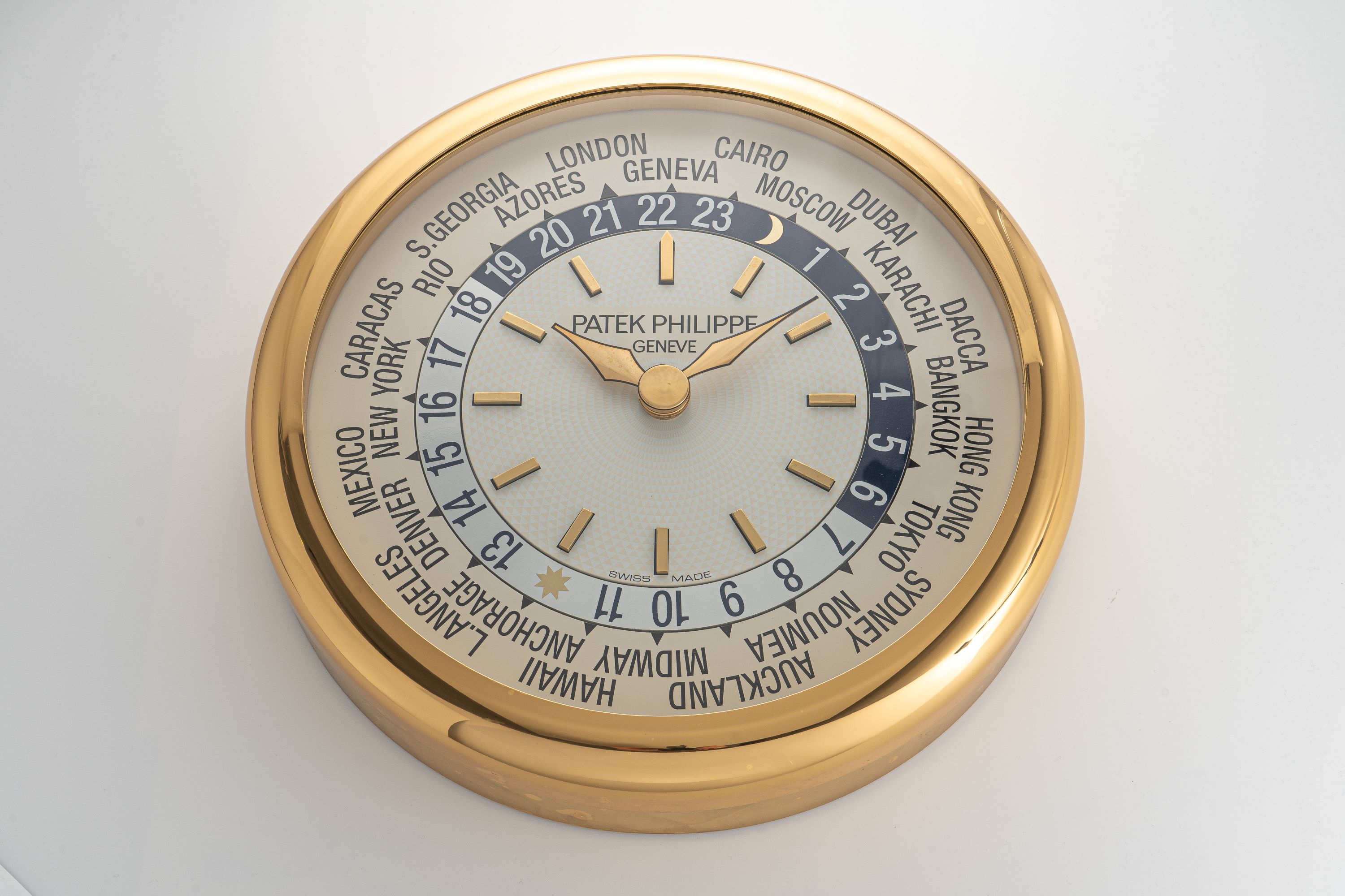 Ineichen Auctioneers - Worldtimer Wall Clock in Gilt Brass