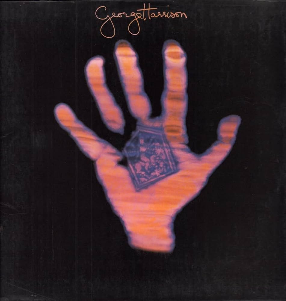 Amazon.co.jp: Living In The Material World + insert: ミュージック