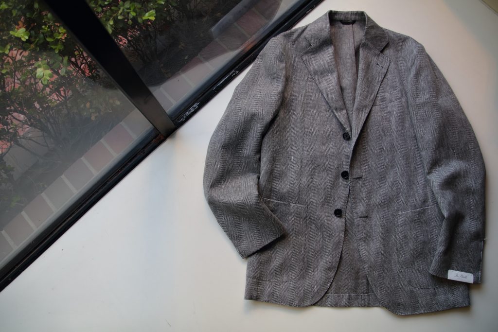 知的ビジネススタイルにはDe Petrilloのヘリンボーンジャケット