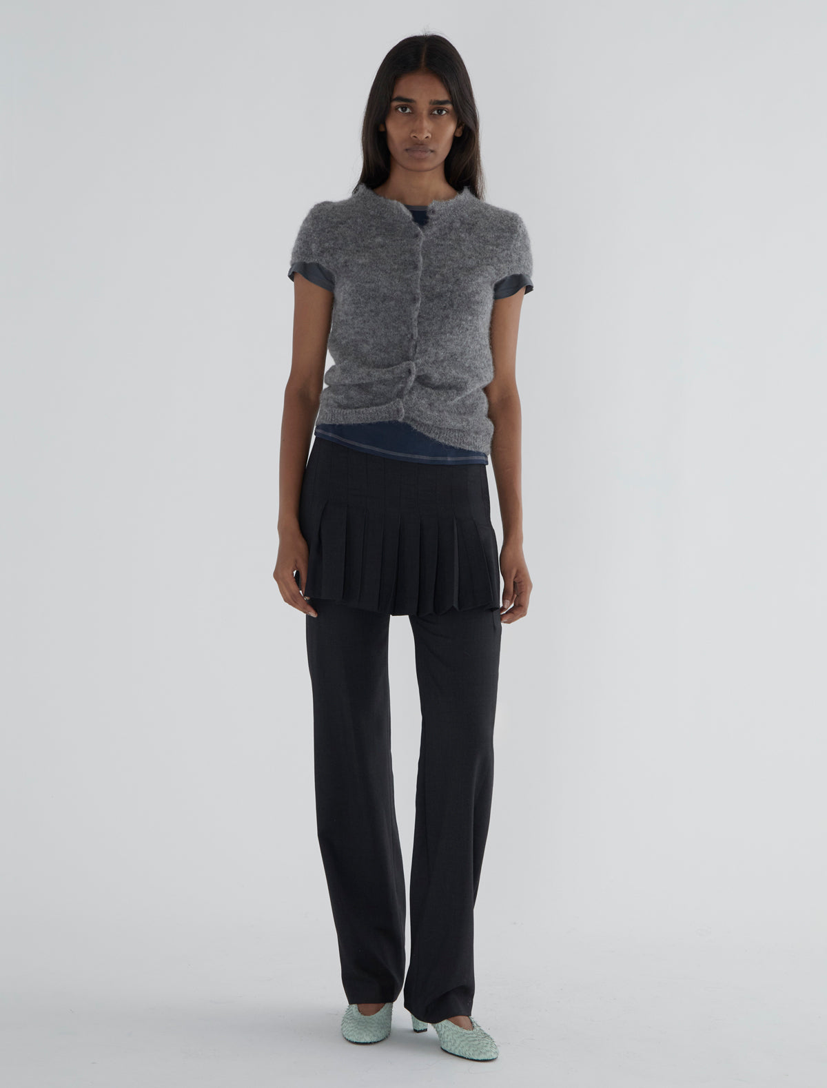 ANDRALE-Trousers with a pleated semi-skirt overlay on the front
