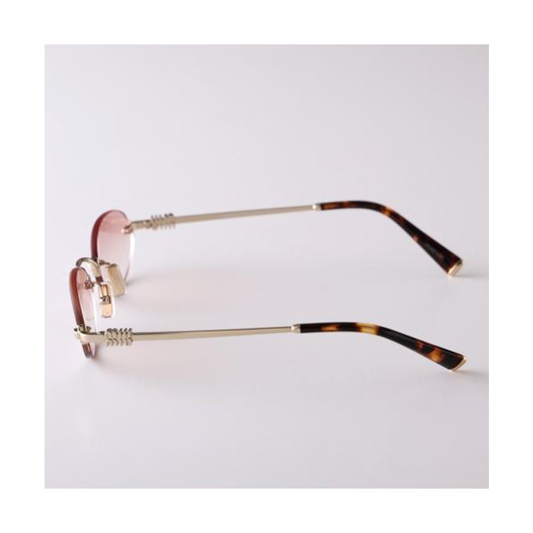 ミュウミュウ Miu Miu MIUMIU サングラス SMU A54 オーバル型 リムレス