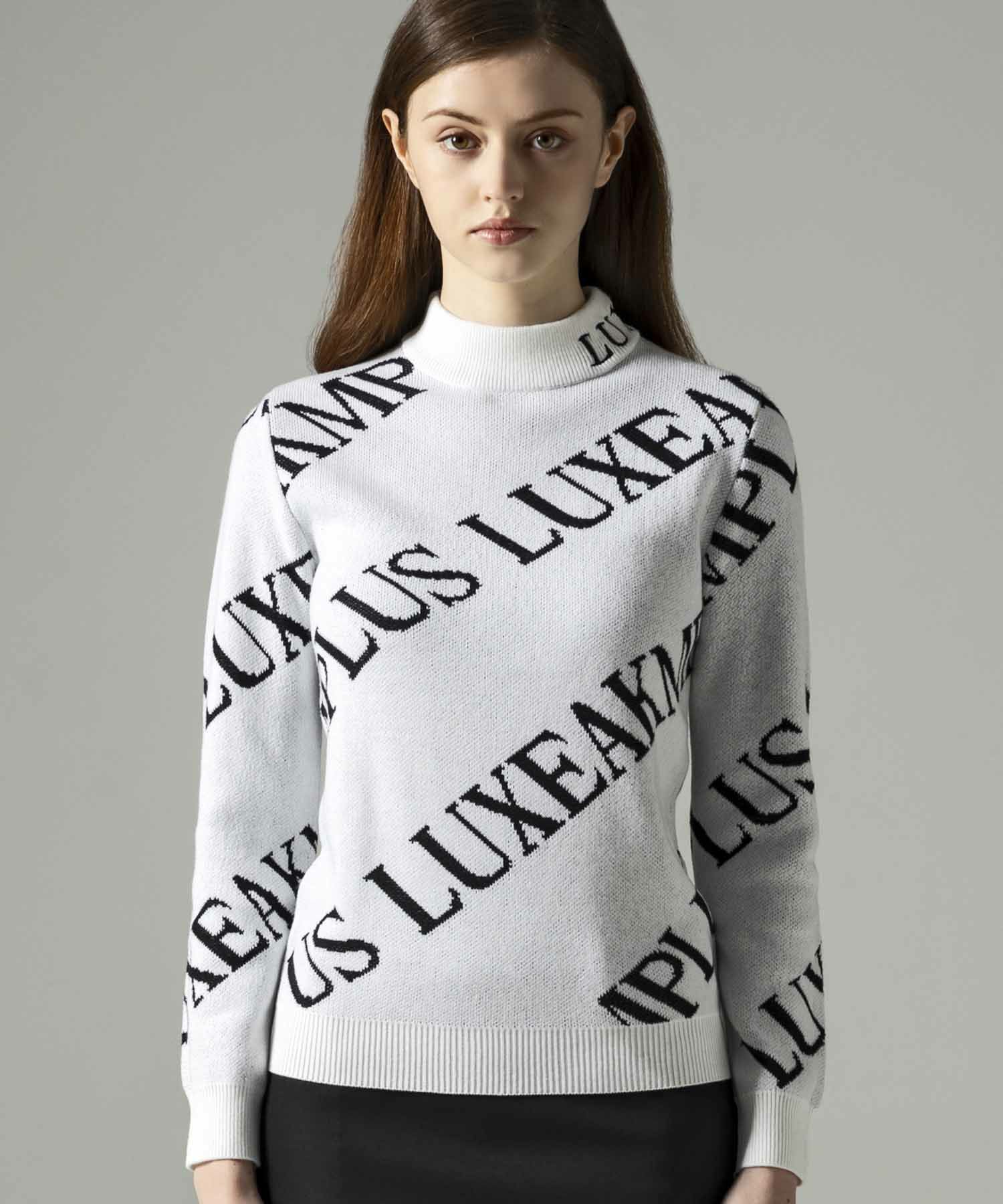 LUXEAKMPLUS(リュクスエイケイエムプラス)ゴルフ 総柄ロゴモックネック