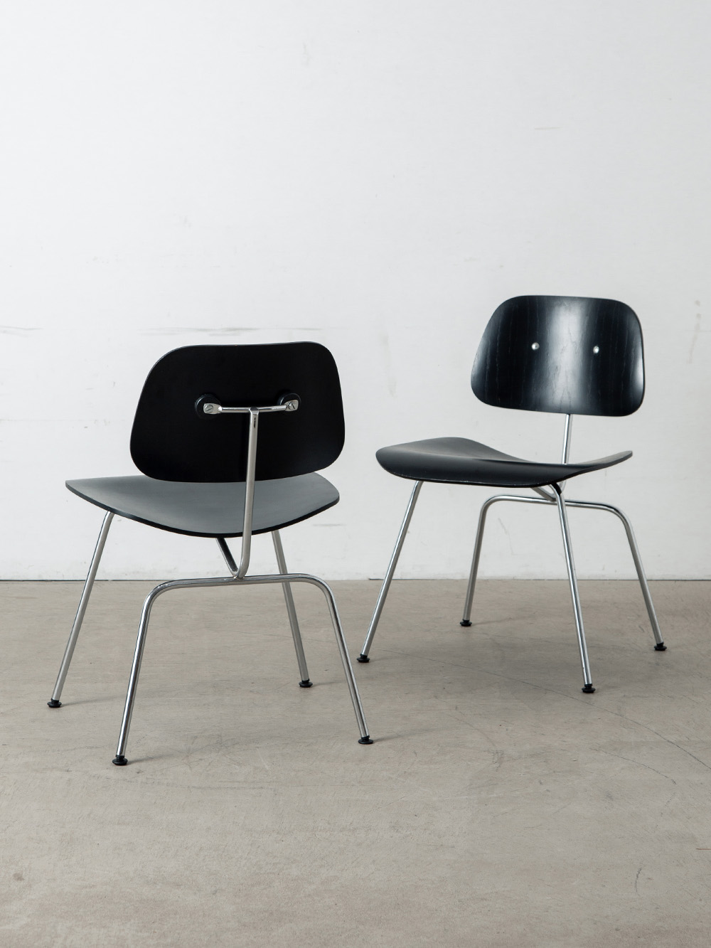 stoop | DCM Chair by Charles & Ray Eames for Herman Miller in