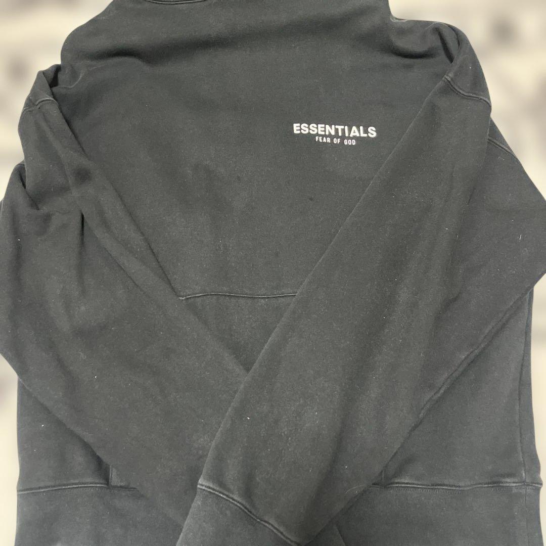 ESSENTIALS ブラック フード付きパーカー - メルカリ