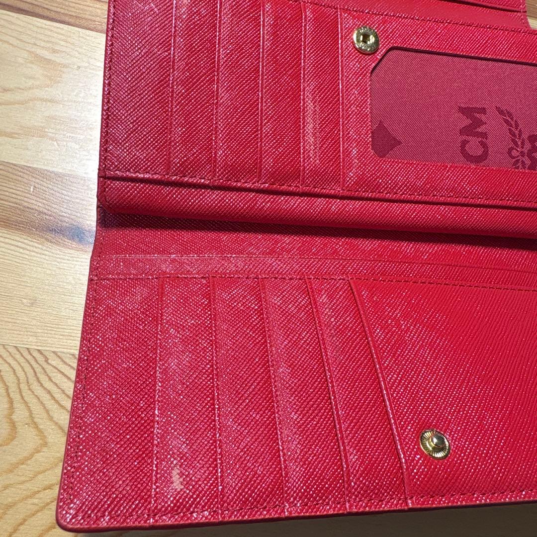 MCM赤レザー.ロゴ型押し箱あり三つ折り長財布.財布.韓国 - メルカリ