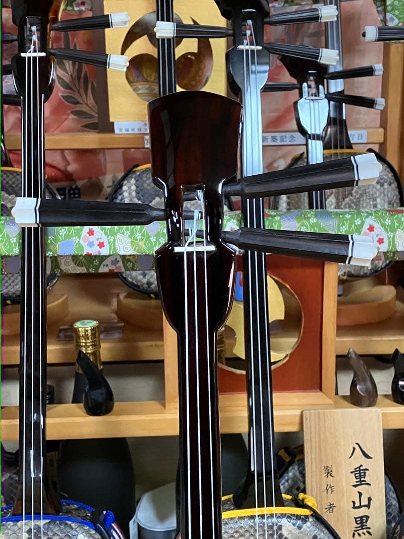 沖縄三線上質黒檀南風原型本皮一枚張りスンチ塗り期間限定出品 - メルカリ