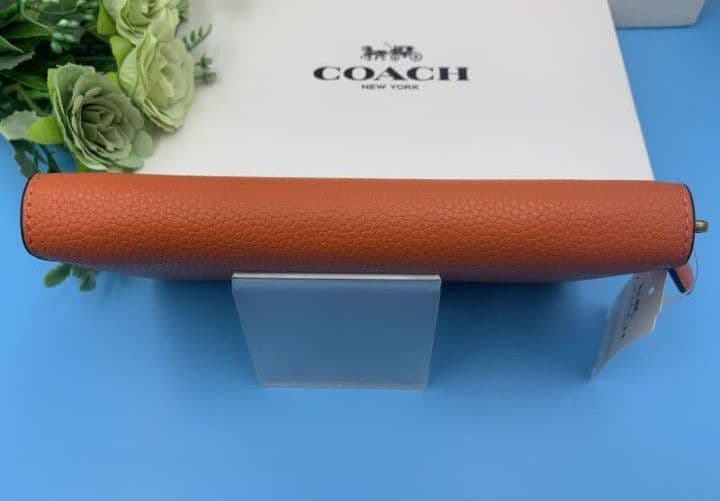 新品未使用コーチ長財布オレンジロングジップレディースメンズ送料無料