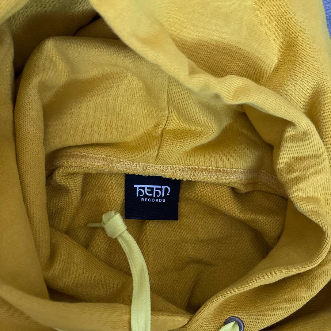 新品未使用】藤井風 花フーディー マスタード Mサイズ - メルカリ