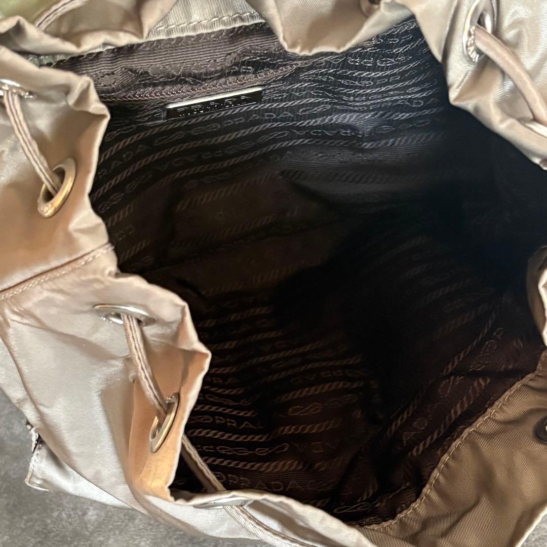 PRADA ナイロン ミニ リュック カーキ 三角 ロゴ ナイロンの通販はau