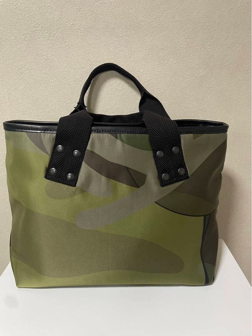 週末値下げ新品未使用sacai KAWS Bag \"Camo\"