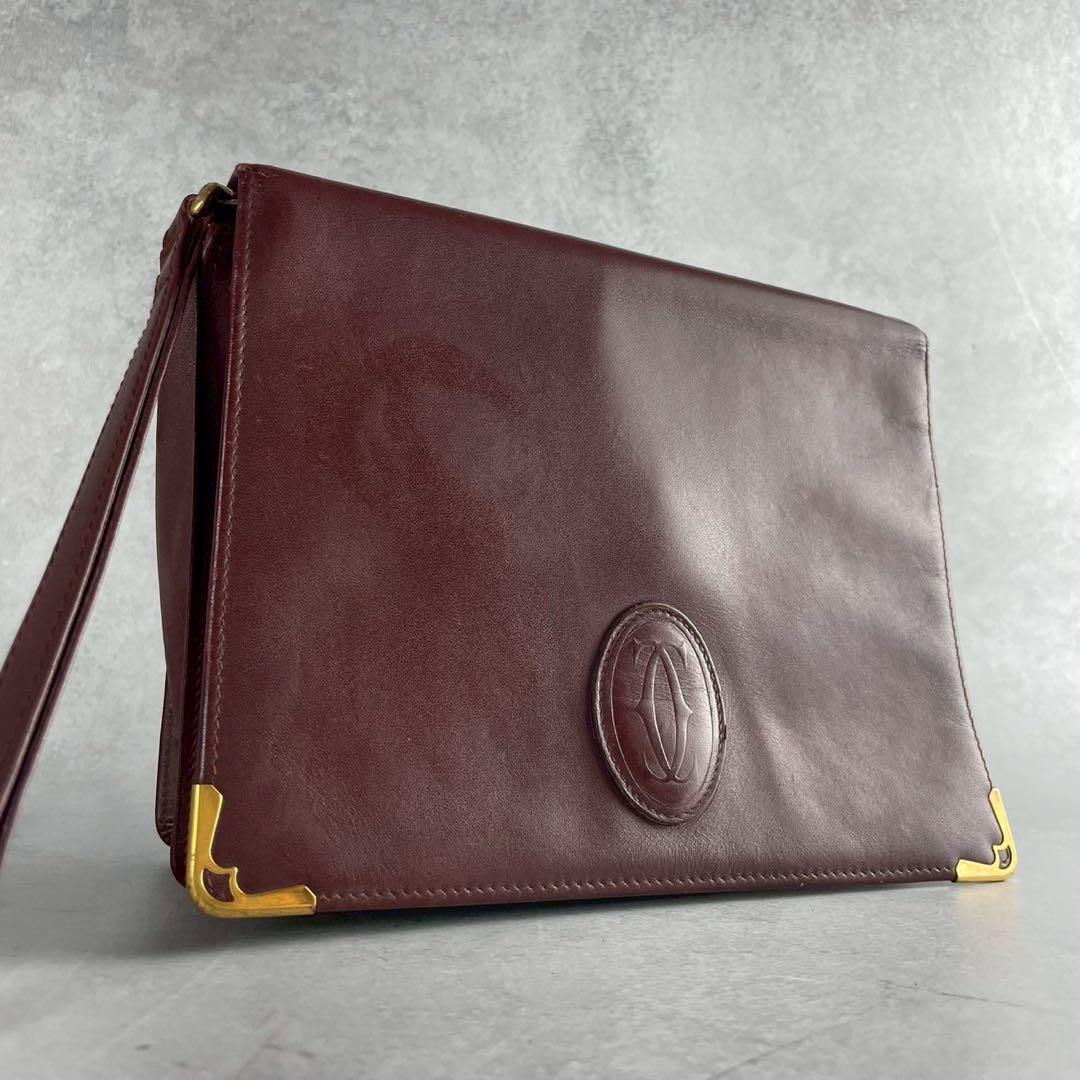 カルティエCartierレザー製 バーガンディクラッチバッグ - メルカリ
