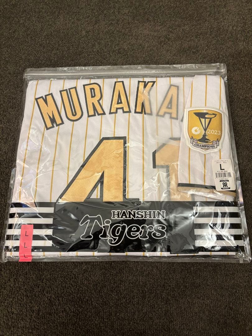 新品未使用 阪神タイガース チャンピオンユニフォーム 村上選手 阪神はゴールドのチャンピオンユニホームを着用してホーム開幕戦へ