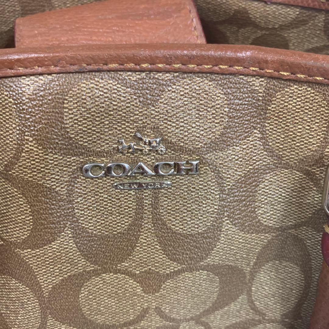Coach ブラウン トートバッグ ハンドバッグ ブラウンのロゴパターンが