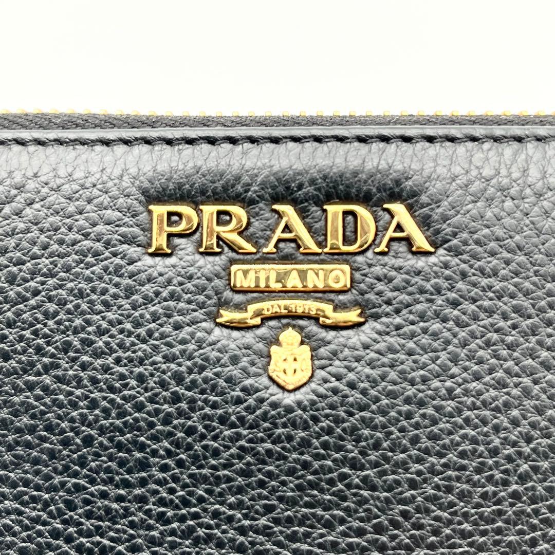 未使用品級】PRADA 長財布 シボ革 ゴールド金具 ブラック ゴールド