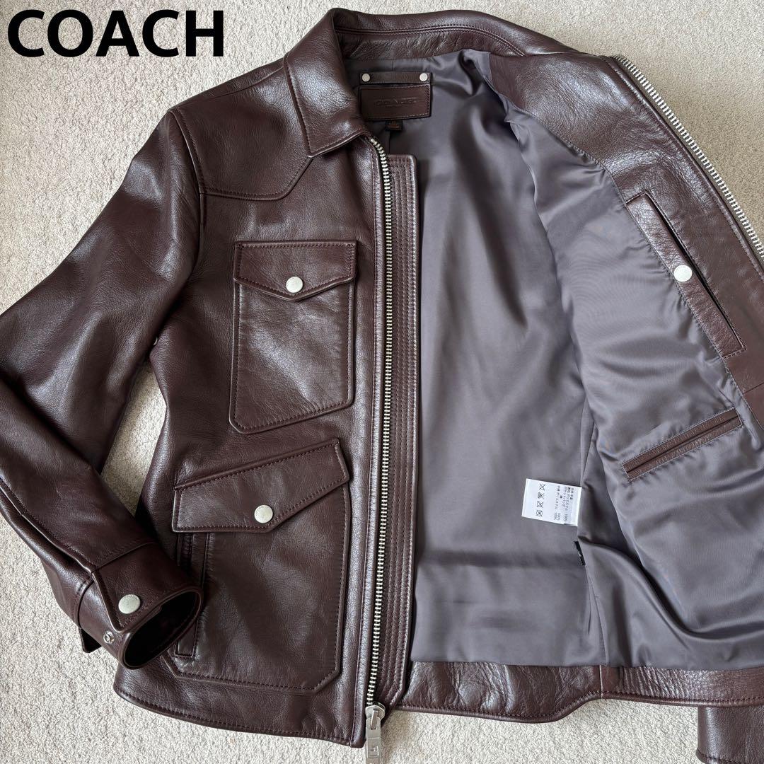 極美品 コーチ フォーポケットレザージャケット ライダース シングル 定価23万 今季のコーチは武骨でモダン──特集：冬スタイルはレザージャケットで