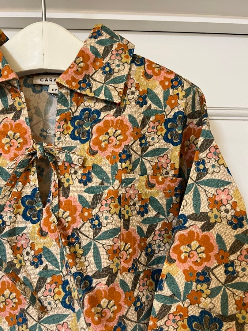 人気商品‼︎《新品・タグ付》CARAMEL 花柄 トップス