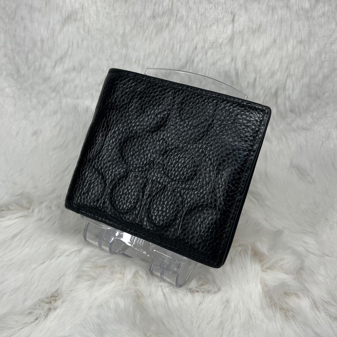 【極美品】COACH黒レザーエンボス加工二つ折り財布 Amazon | COACH/コーチ シグネチャーエンボスドレザー メンズ二つ折り