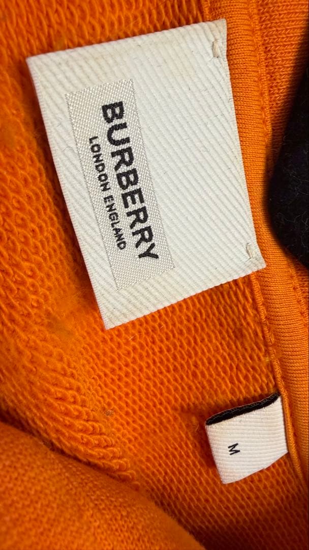 BURBERRY オレンジ フード付きパーカー - メルカリ