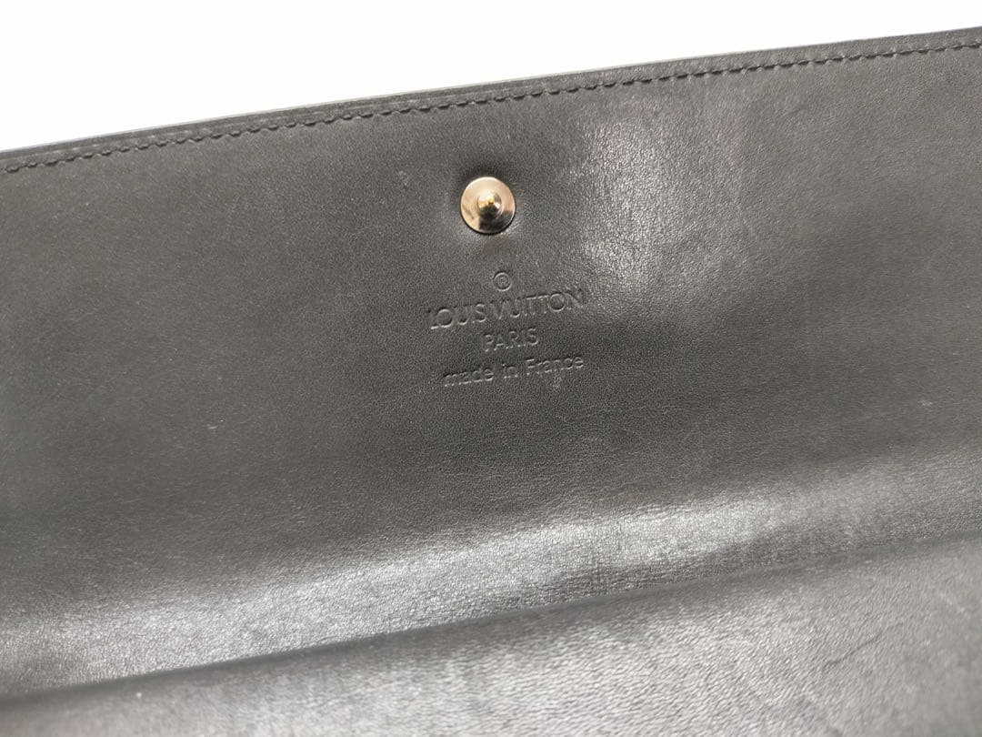 Louis Vuitton エンボス加工 長財布 ブラック - メルカリ