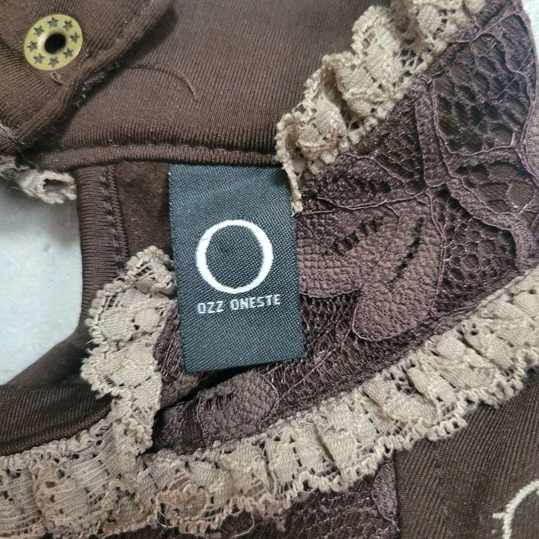 美品 オッズオネスト 天使柄 肩出しレースアップワンピース 茶 - メルカリ