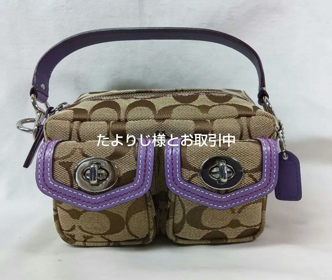 COACH(コーチ) ポーチ　ハンドバッグ　シグネチャー柄　ダブルターンロック 公式】COACH – コーチ | ツイン ターンロック バッグ 20