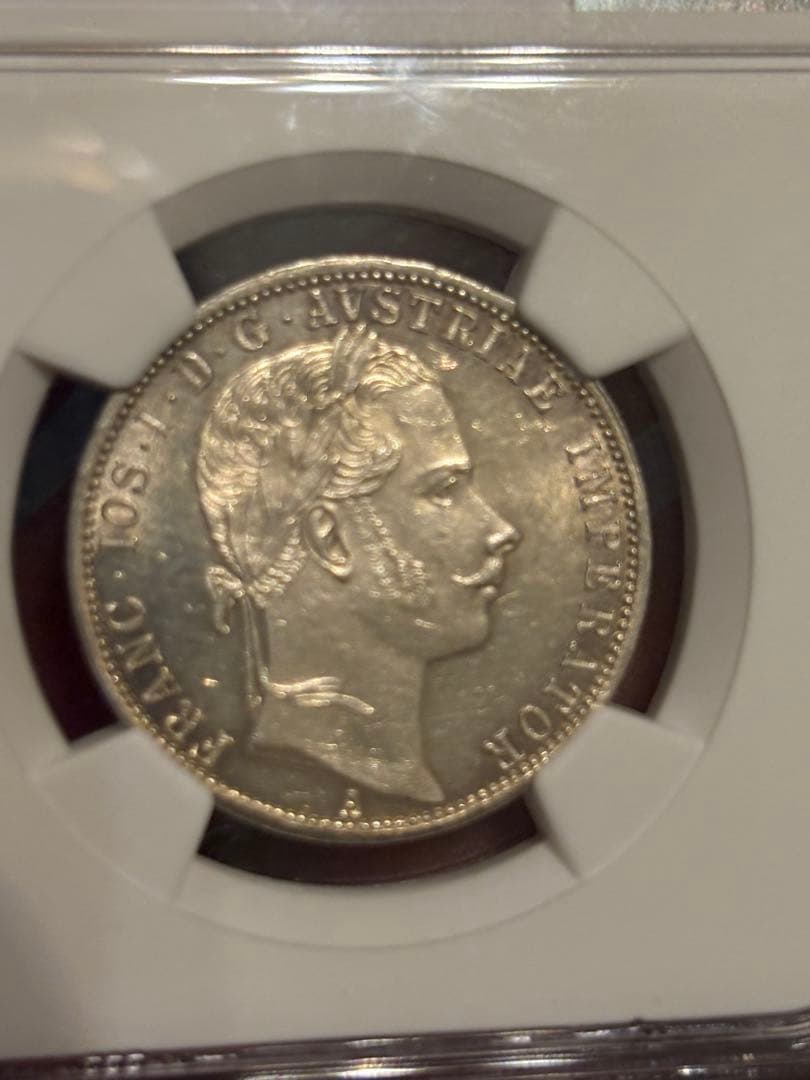 1861年発行のオーストリア1フロリン銀貨（ミントマーク“A”、ウィーン造幣局） 1861年発行のオーストリア1フロリン銀貨（ミントマーク“A”、ウィーン