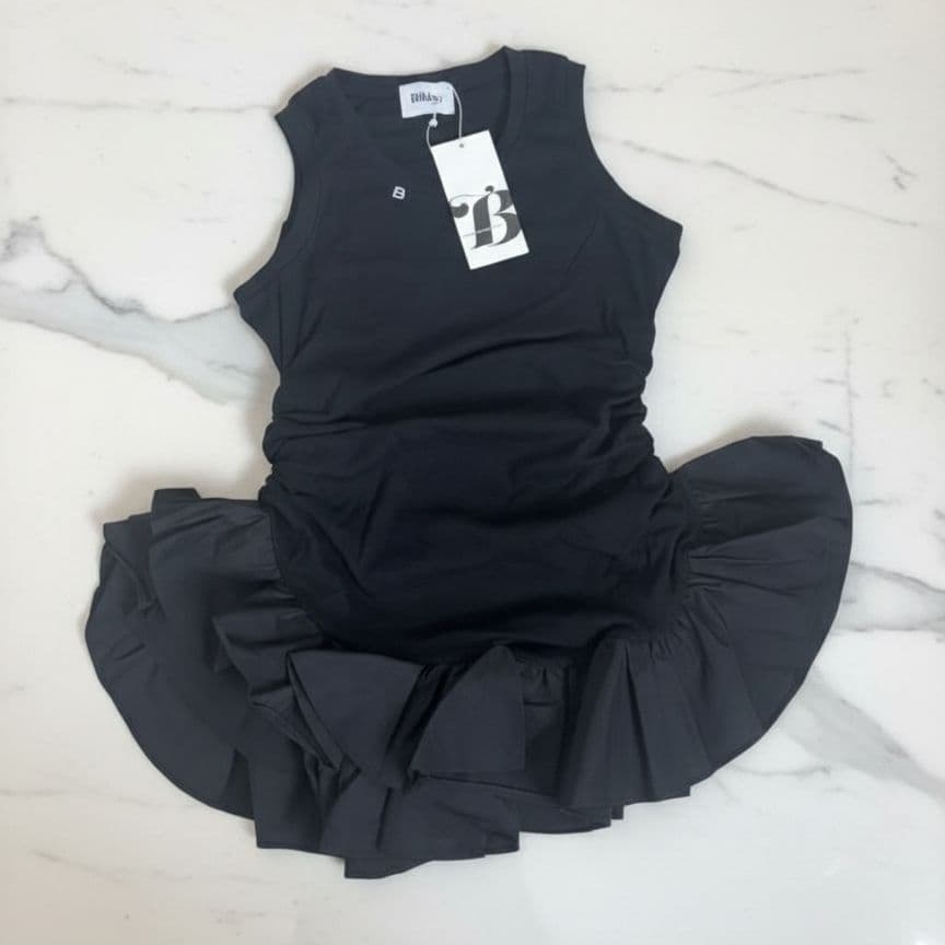 新品未使用】Bibiy.IRIS RUFFLE TOP（BLACK） - メルカリ