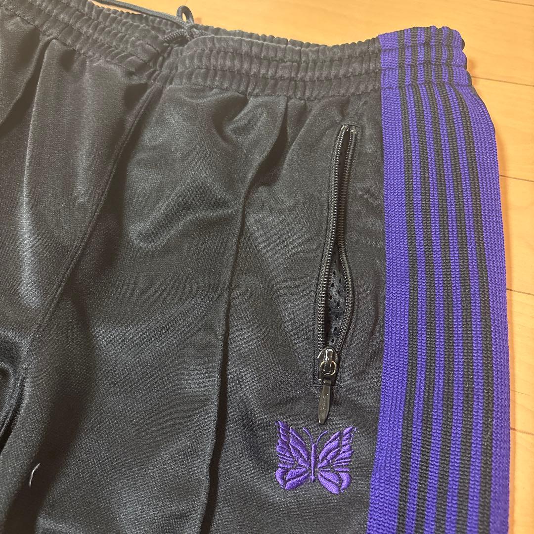 needles ブラック 紫ストライプ トラックパンツ - メルカリ