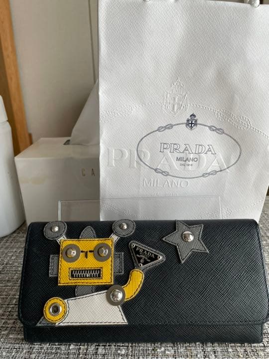 送料込】プラダ ロボット 長財布 サフィアーノレザー PRADA - メルカリ