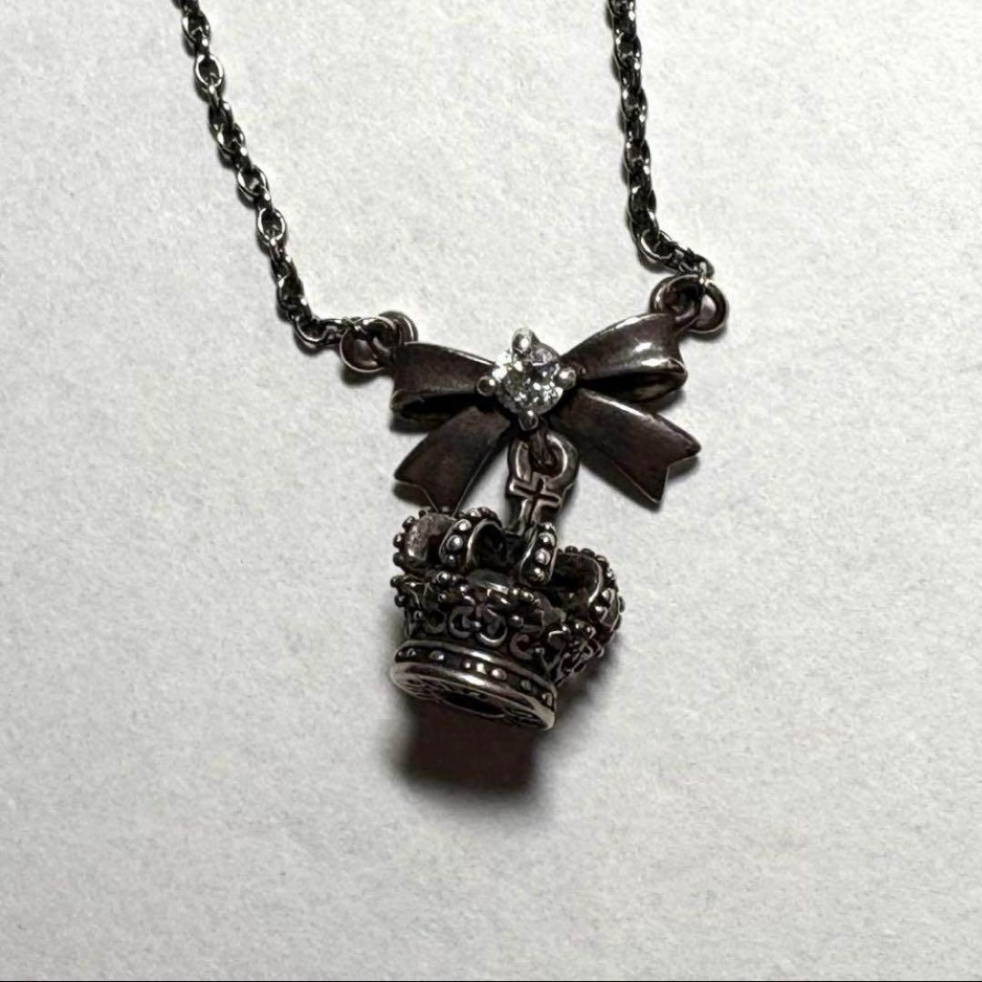 ジャスティンデイビス リボン PETIT FADEITネックレスSNJ351